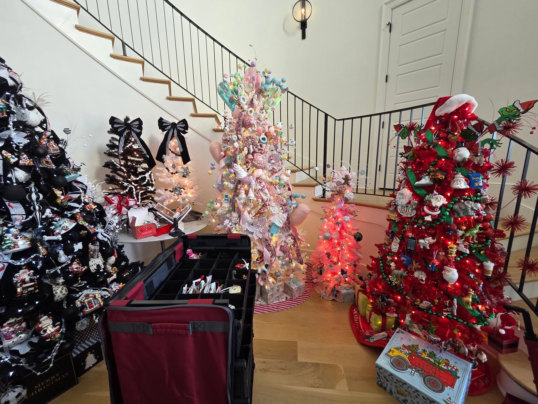 Several themed Christmas trees styled in one Franklin home